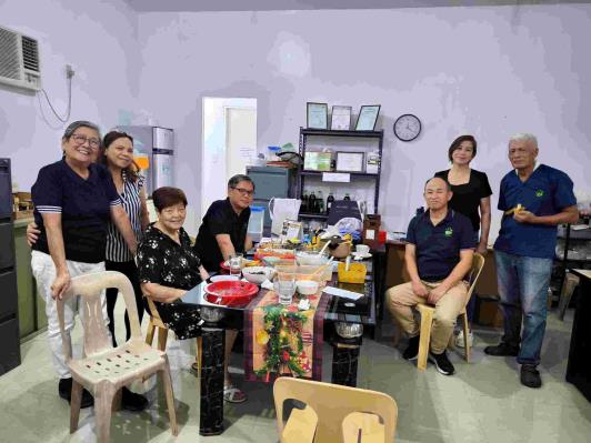 Mr. Ricky (center left) and EMRPI (EM Research Philippines, Inc.) staff