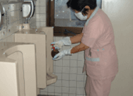 Spraying AEM inside the urinals 