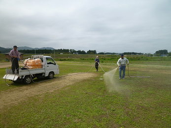 Spraying AEM on the ground golf course